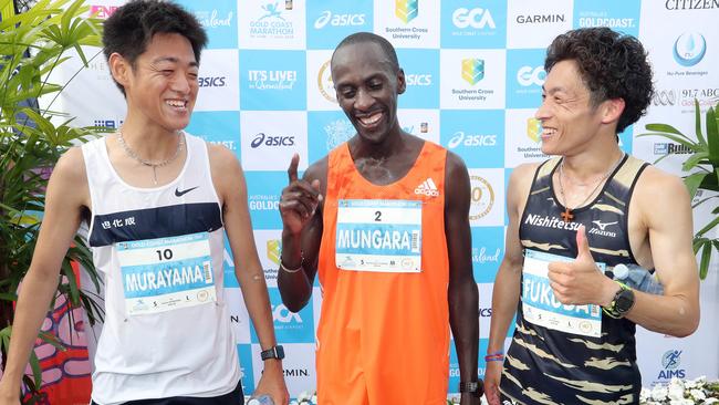 Gold Coast Marathon 2018: Race winner Kenneth Mungara (middle) with Kento Murayama 2nd place (L) and Jo Fukuda 3rd. Photo: Richard Gosling