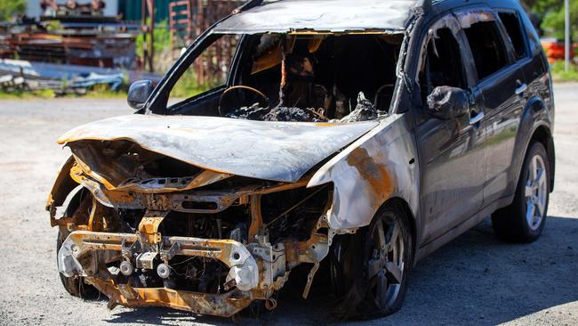 The charred car. Picture: Mark Stewart