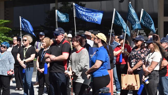 The council workers shouted in unison at their Nicholas St office building that they wanted "equal pay" "now". Picture: Jessica Baker