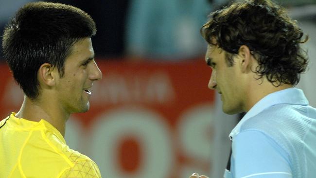 Switzerland's Roger Federer, right, is congratulated by Serbia's Novak Djokovic after their fourth round match at the Australian Open tennis tournament in Melbourne in 2007. Federer won 6-2 7-5 6-3. Picture: AAP