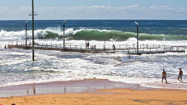 The 15-year-old teenage boy’s friends pulled him from the surf at Mona Vale Beach at about 11am. Picture: Doug Cliff