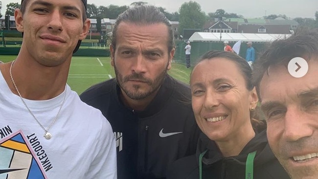 Alex Popyrin, left, with his grasscourt coach Pat Cash, right