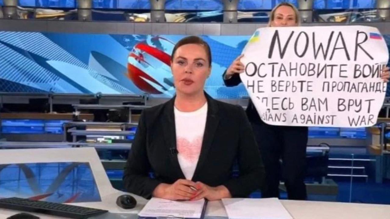 Russian Channel One editor Marina Ovsyannikova crashed a live broadcast with a poster reading “Stop the war. Don't believe the propaganda. Here they are lying to you”. Picture: Handout/AFP