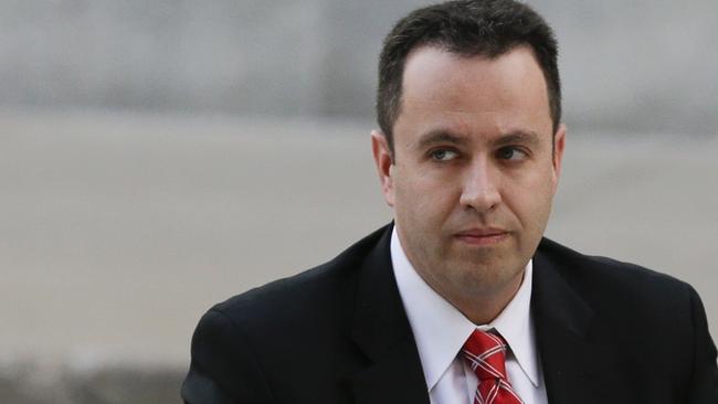 FILE - In this Nov. 19, 2015 file photo, former Subway pitchman Jared Fogle arrives at the federal courthouse in Indianapolis. Fogle is being sued by a girl who's one of the victims in the sex crimes case that sent him to prison for more than 15 years. The federal lawsuit filed Tuesday, March 15, 2016, names Fogle and the former head of his anti-obesity charity, Russell Taylor. It also names Taylor's wife. (AP Photo/Michael Conroy, File)