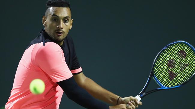 KEY BISCAYNE, FL — MARCH 27: Nick Kyrgios of Australia plays a backhand against Alexander Zverev of Germany in their fourth round match during the Miami Open Presented by Itau at Crandon Park Tennis Center on March 27, 2018 in Key Biscayne, Florida. Clive Brunskill/Getty Images/AFP == FOR NEWSPAPERS, INTERNET, TELCOS &amp; TELEVISION USE ONLY ==