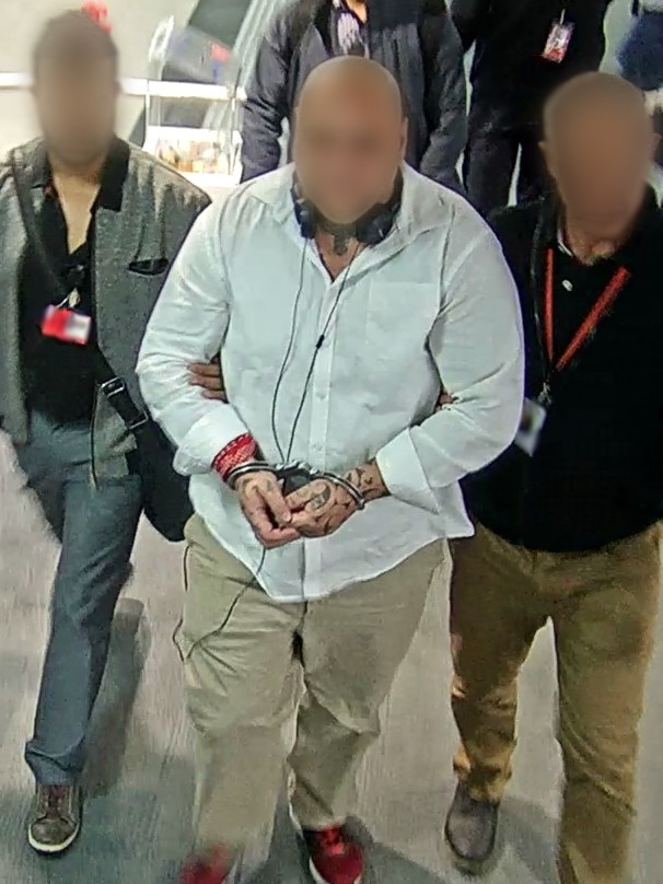 New Zealand Mongrel Mob thug Timoti Kapene Te Amo has been deported. Australian Border Force officials put teh convicted criminal on a plane from Melbourne to Auckland on October 24, 2018.