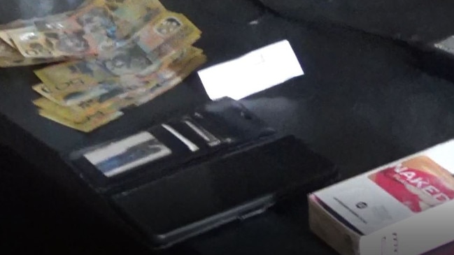 The cash and condoms found in the hotel room Jonathon Henke had booked. Photo: SAPOL