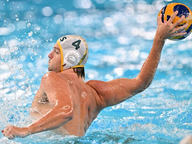 Charlie Negus scored the final goal for the Sharks as they downed the reigning Olympic champions. Picture: Andreas Solaro / AFP