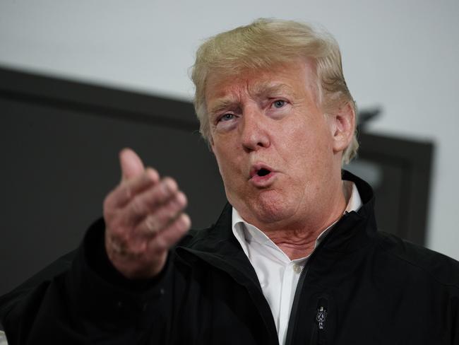 President Donald Trump speaks during a briefing with state and local officials on the response to Hurricane Michael, Monday, Oct. 15, 2018, in Macon, Ga. (AP Photo/Evan Vucci)