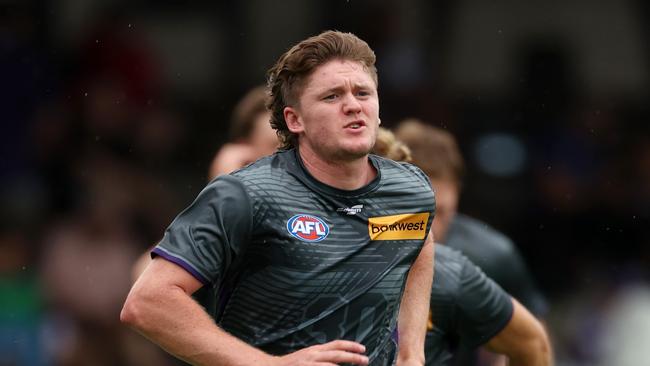 PERTH, AUSTRALIA - FEBRUARY 24: Nathan O'Driscoll of the Dockers warms up before an AFL practice match between West Coast Eagles and Fremantle Dockers at Mineral Resources Park on February 24, 2024 in Perth, Australia. (Photo by Will Russell/Getty Images)