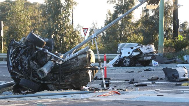 A car has been torn in two at a fatal crash on Plenty Rd South Morang. Picture: David Crosling