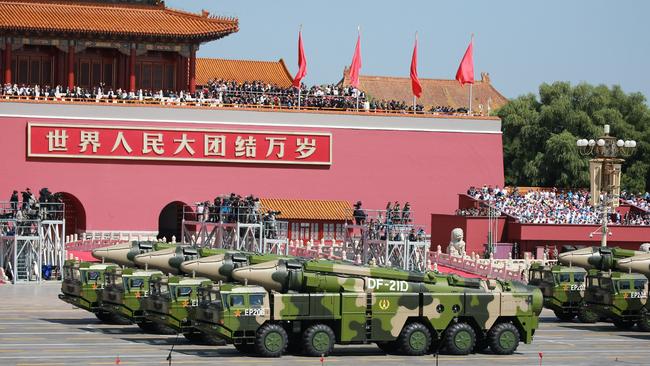 Military vehicles carrying DF-21D anti-ship ballistic missiles march past the Tiananmen Rostrum during the military parade to commemorate the 70th anniversary of the victory in the Chinese People's War of Resistance Against Japanese Aggression in Beijing.