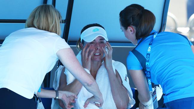 Alize Cornet of France struggles with the heat in her third round match against Elise Mertens of Belgium on day five of the 2018 Australian Open. Picture: Getty Images