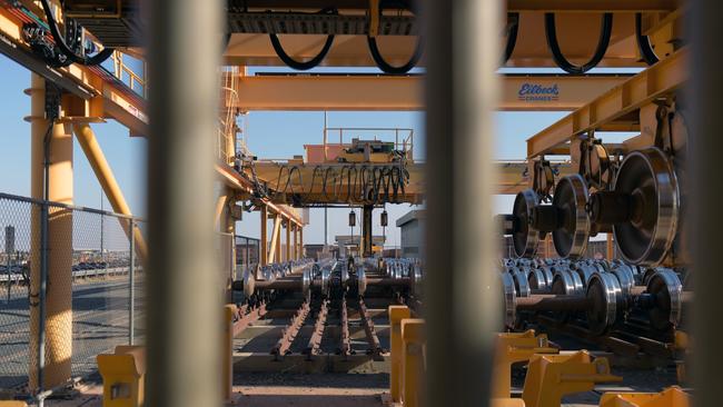 Locomotive wheel sets in a fenced off area in the rail yard at a Rio Tinto Group rail maintenance hub in Karratha. Picture: Bloomberg