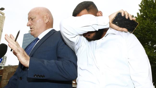 Lawyer Dennis Stewart and Abraham Zreika outside Parramatta Local Court. Picture: John Appleyard