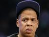 Rap moguls Sean "Puffy" Combs, left, and Jay-Z attend the NBA All-Star basketball game, Sunday, Feb. 15, 2015, in New York. (AP Photo/Kathy Willens)