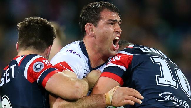 SYDNEY, AUSTRALIA - SEPTEMBER 28:  Dale Finucane of the Storm is tackled during the NRL Preliminary Final match between the Sydney Roosters and the Melbourne Storm at the Sydney Cricket Ground on September 28, 2019 in Sydney, Australia. (Photo by Jason McCawley/Getty Images)