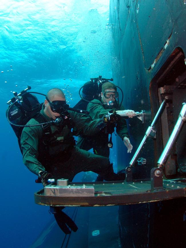 US submariners aboard a Virginia class submarine.