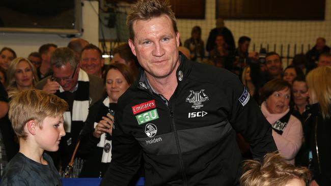 Nathan Buckley celebrates with his family in the rooms. Picture: Michael Klein