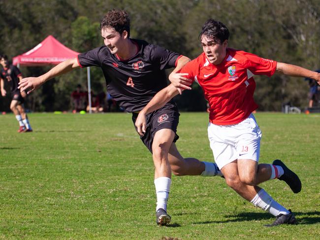 Gregory Terrace and Ipswich Grammar School First XI football action.