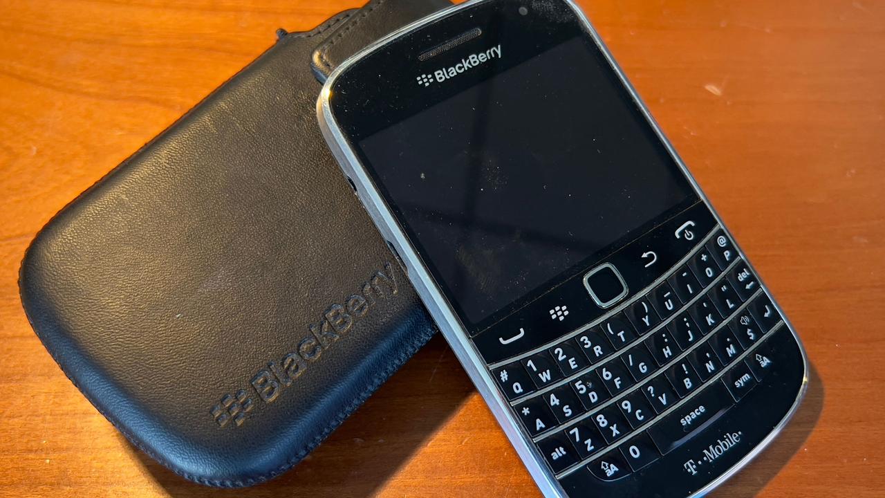 The BlackBerry was one of the first mobile phone devices with a full Qwerty keyboard and the ability to send and receive email. Picture: Daniel Slim / AFP.