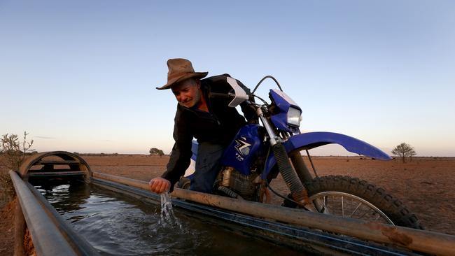 Shane Oldfield a pastoralist who has been cutting back his cattle due to the lack of rain in the area and has also battling with BHP over water from the Great Artesian Basin on his property Clayton Station.