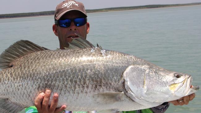 The author with a 101cm barra captured during a hot session in Shoal Bay.