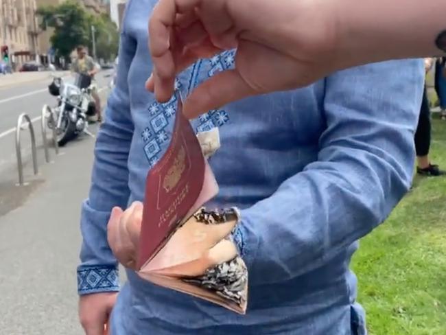 A Russian man burned his passport during a pro-Ukraine protest in Melbourne