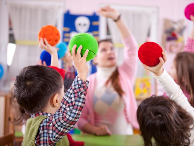 iStock image of children at a childcare centre having fun.