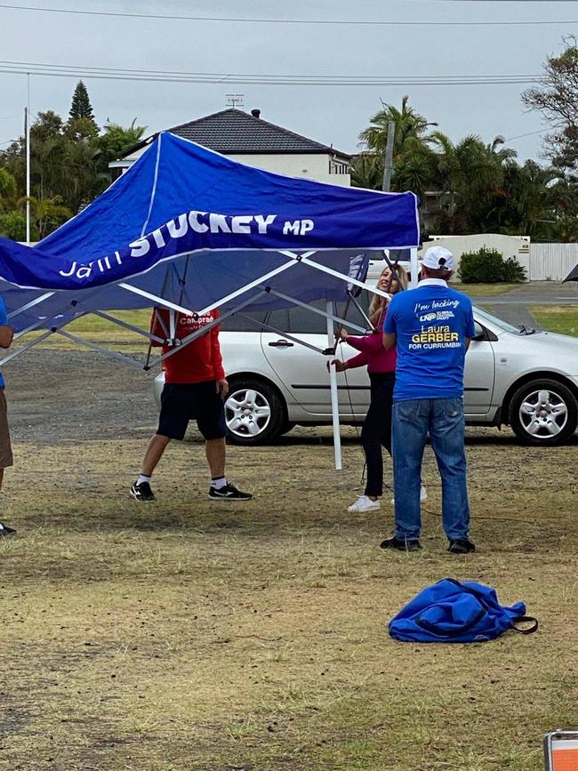 Currumbin MP Laura Gerber seen putting up a marquee at a prepoll station with former MP Jann Stuckey's name on it. Photo: Facebook