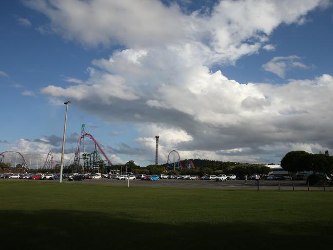 A young boy has been rushed to hospital with a serious head injury after falling from a ride at Movie World.