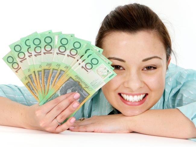 Attractive woman holding lots of Australian Money, generic