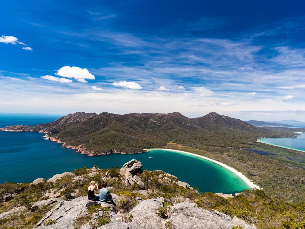 The iconic Wineglass Bay, from the summit of Mt Amos, a popular hike within Freycinet National Park Picture: Nigel Killeen