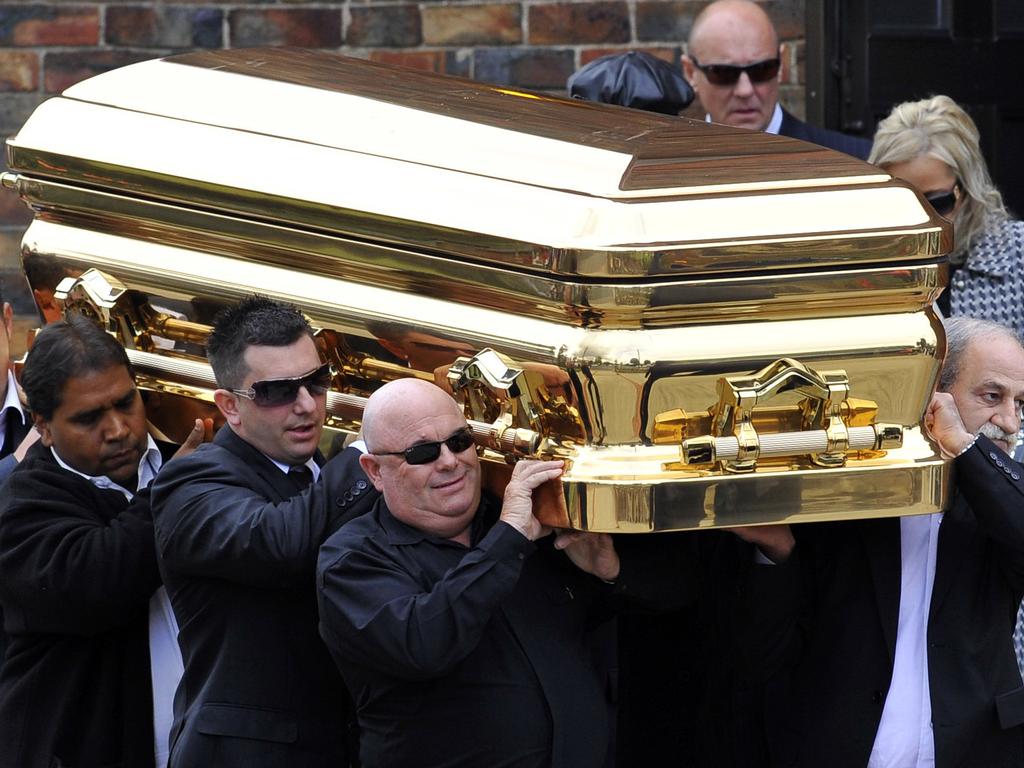 Carl Williams’ gold coffin at his funeral in 2010. Picture: Julian Smith