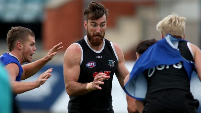 Charlie Dixon trains with intent at Alberton last week. Picture: AAP Image/Kelly Barnes