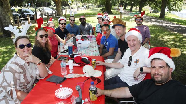 MELBOURNE, AUSTRALIA- NewsWire Photos DECEMBER 20, 2024:  People enjoy a Xmas work gathering on the Banks of the Yarra on the Friday before Chistmas.Picture:  NewsWire/ David Crosling