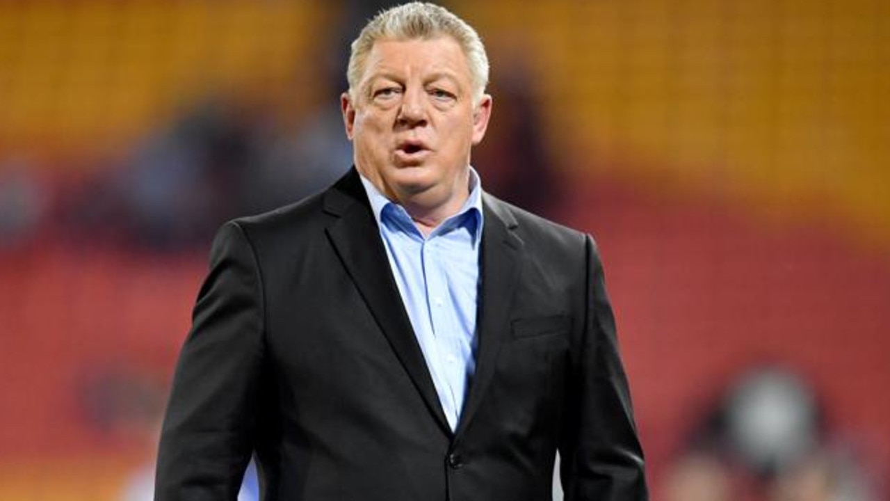 Television commentator Phil Gould is seen during the Round 22 NRL match between the Brisbane Broncos and the Penrith Panthers at Suncorp Stadium in Brisbane, Friday, August 16, 2019. (AAP Image/Darren England)