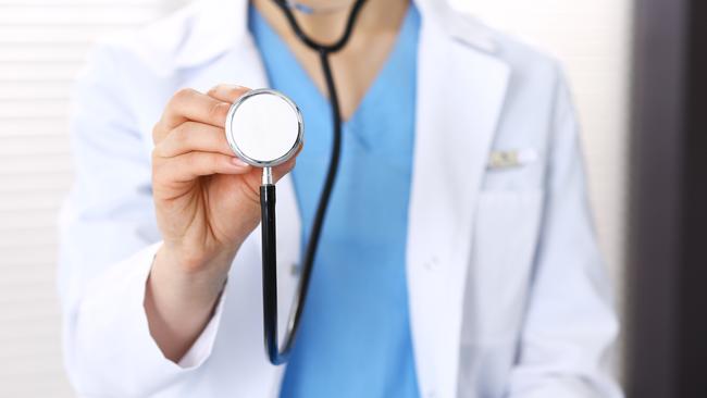 Doctor woman holds stethoscope head, close-up. Physician ready to examine and help patient. Helping and insurance in health care, best treatment and medicine concept.