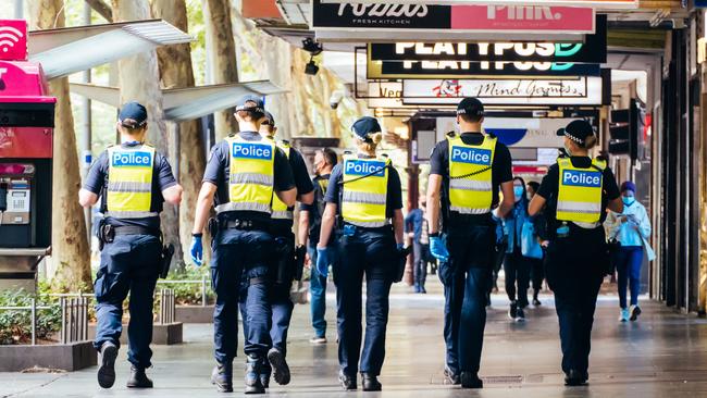 Police patrol the streets of Melbourne at the start of a “circuit breaker” lockdown.