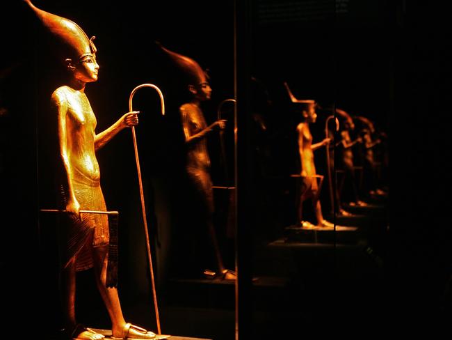 A golden figure depicting King Tutankhamun as the King of Upper Egypt. But is it really one of his older sisters, whose reign has been concealed from history? Picture: AFP