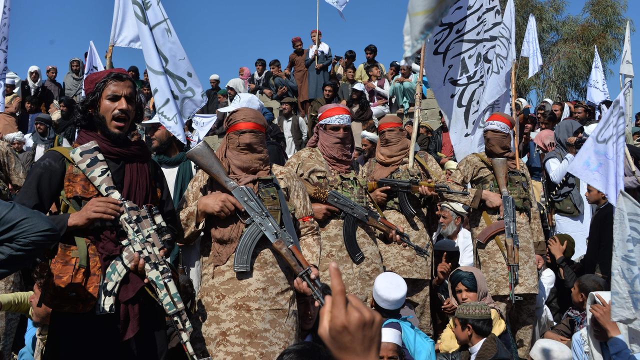 Afghan Taliban militants and villagers attend a gathering in Alingar district of Laghman Province. Picture: AFP