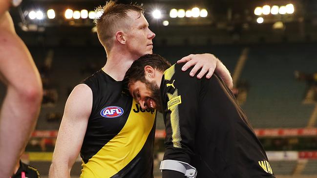 Jack Riewoldt with Alex Rance after the star injured his knee. Picture: Getty Images