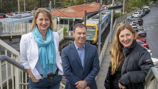 Labor MP's Vicki Ward, Colin Brooks and Danielle Green at Greensborough station. Picture: Andy Brownbill