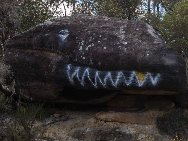 GV's of Morgan Rd, which runs between Oxford Falls and Belrose. The road has (apparently) become a bit of a goat track that is being used as a rat run by motorists trying to avoid the traffic chaos around the hospital at Frenchs Forest . The road was pictured at the large rock that is painted to look like the head of a blue-tongue lizard on 3rd December 2017. (AAP Image / Julian Andrews)