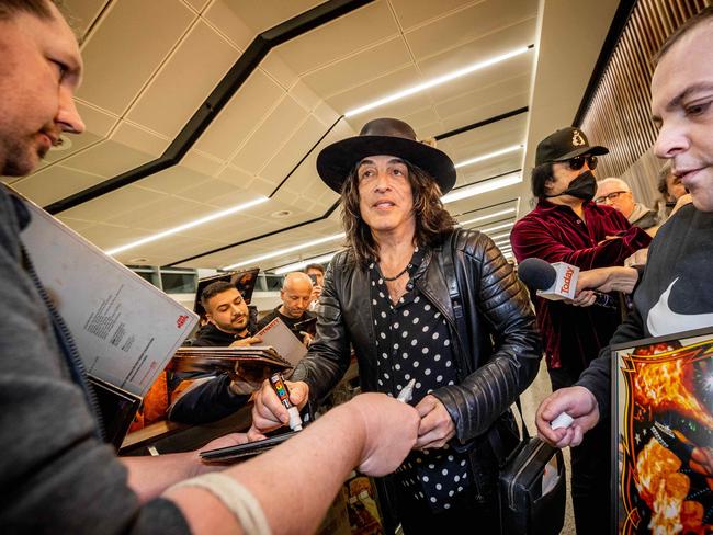 Paul Stanley signs autographs for fans upon arrival at Melbourne Airport to begin the Australian leg of the End of the Road Tour. Picture: Jake Nowakowski