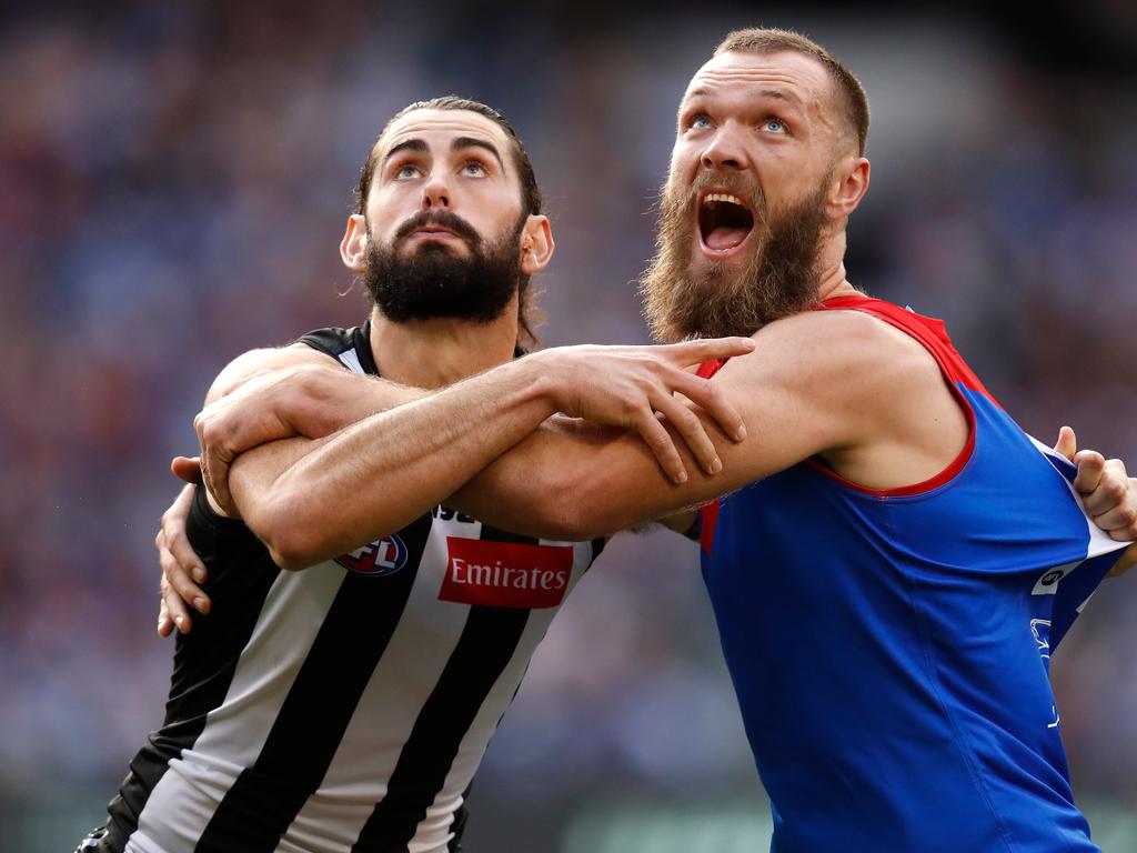 Brodie Grundy of the Magpies battles with Max Gawn of the Demons