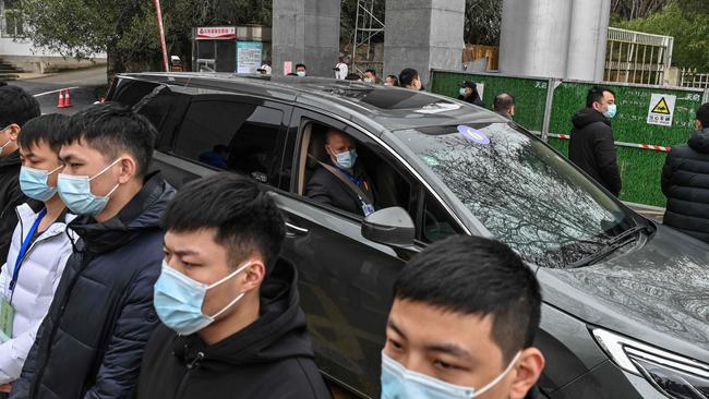 Members of the WHO team in Wuhan in February. Picture: AFP