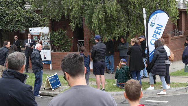 Groups outside a Preston auction earlier this month. Picture: David Crosling