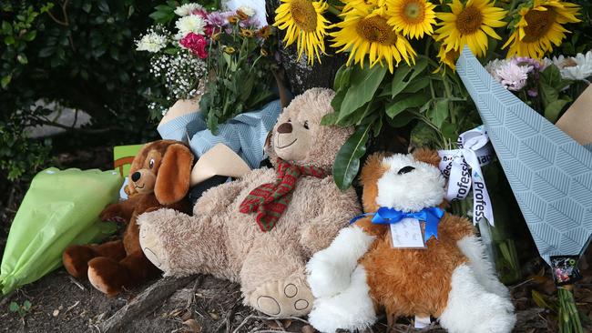 Members of the public have laid flowers and left teddies at the Goodstart Early Learning Centre, Edmonton, following the tragic death of a boy, 3, left in a minibus. PICTURE: BRENDAN RADKE