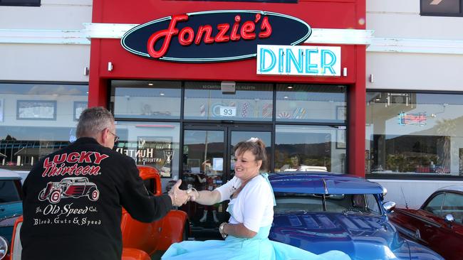 August 16, Family-run 50s inspired diner Fonzies has opened in Kilsyth. Daughter Tiarnie  and parents Lee and Debbie run, decided to open it after shock death of their son in 2018. Lee and Debbie out the front of the diner have a dance.Picture: Stuart Milligan